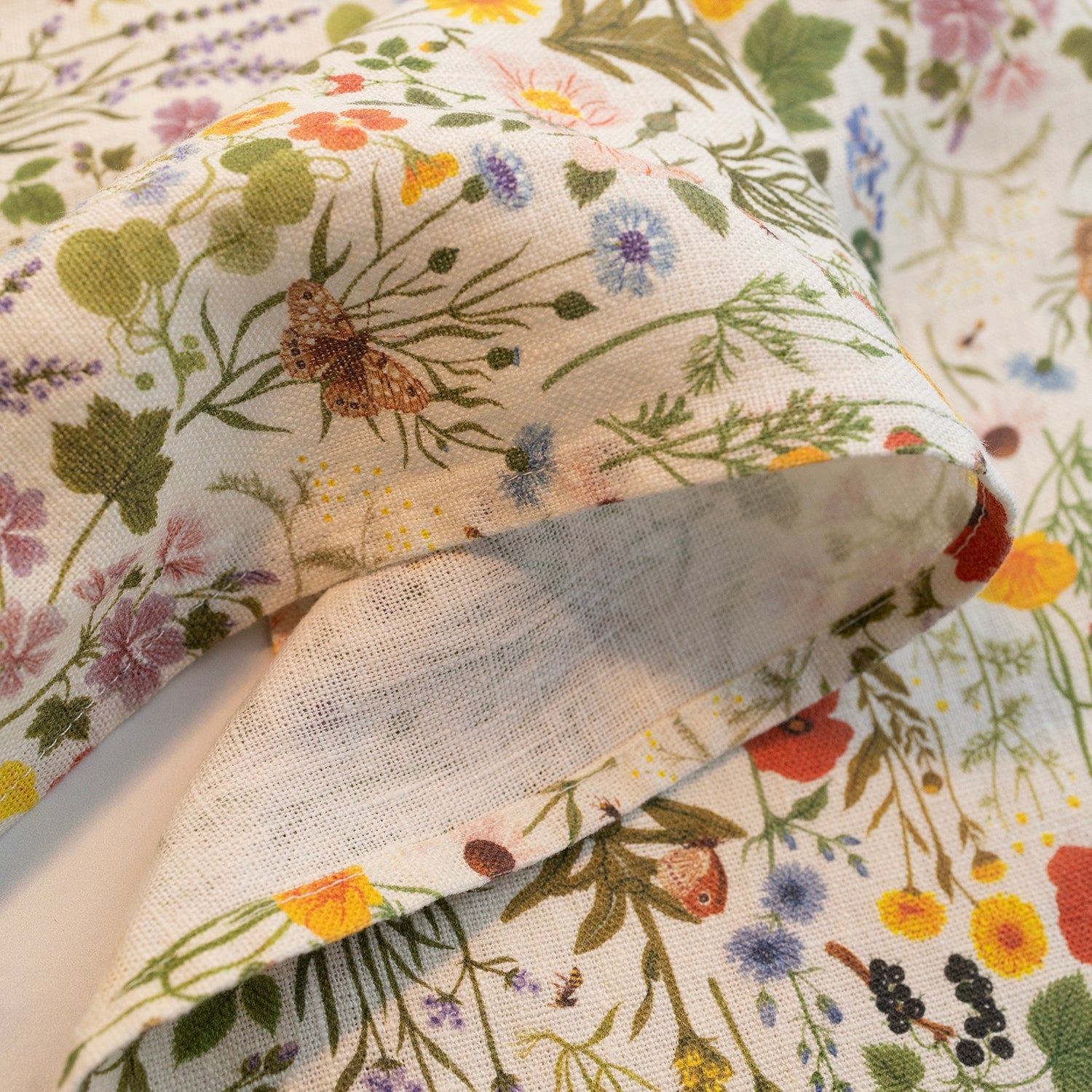 Close view of the Botanist pattern printed on washed linen